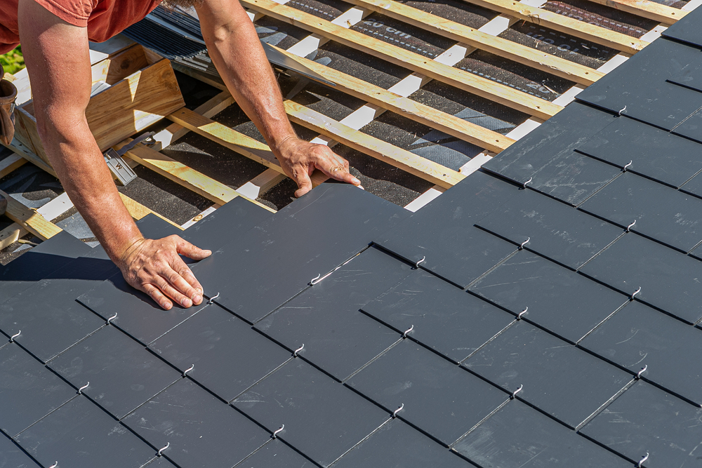 Hermitage Roofing working on a slate roof repair